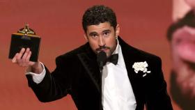 Bad Bunny makes history with Debí Tirar Más Fotos, becoming the first all-Spanish album to win Album of the Year